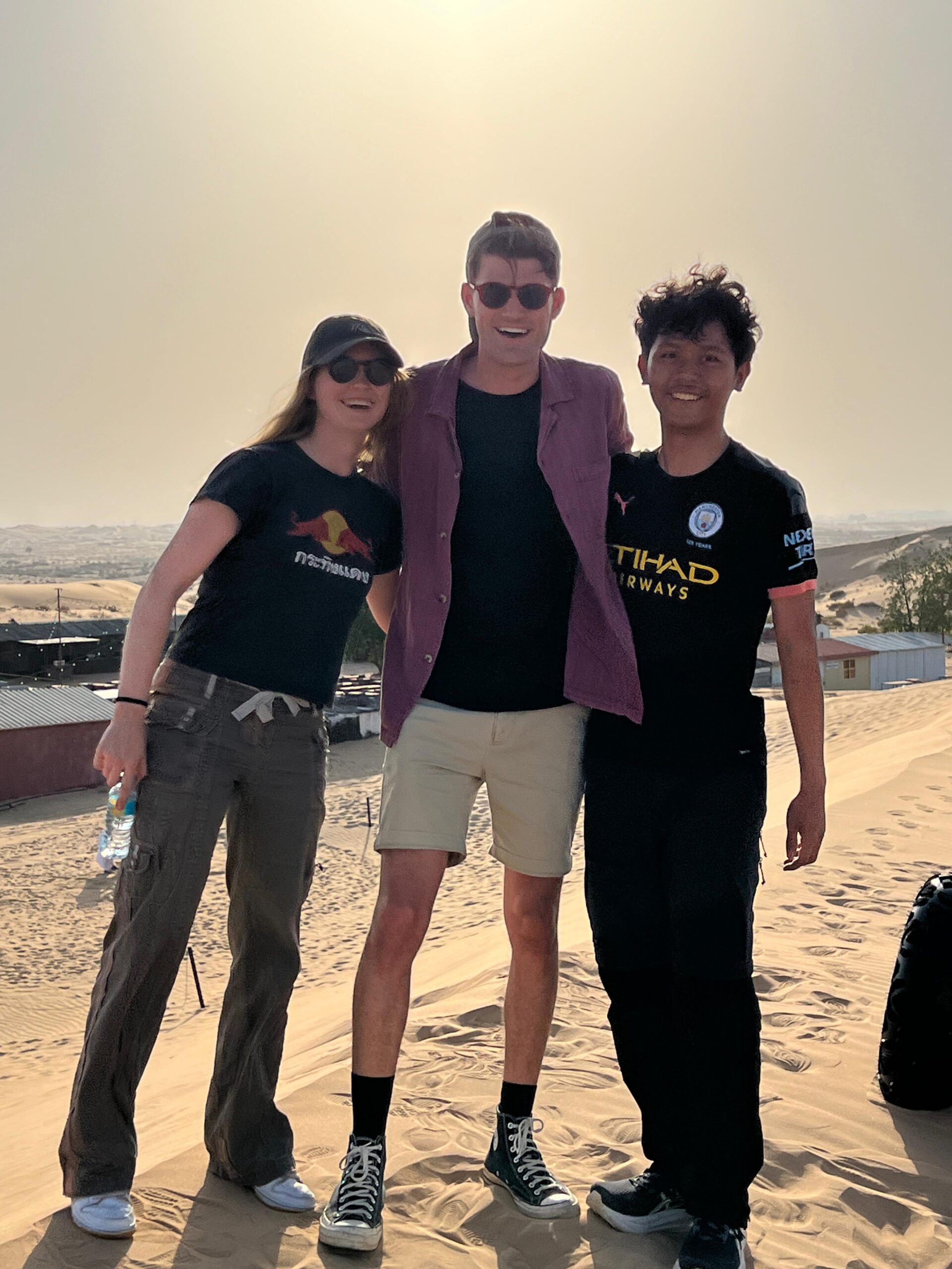 Experience the thrill of dune bashing in a powerful 4x4 Land Cruiser on the red dunes of Abu Dhabi