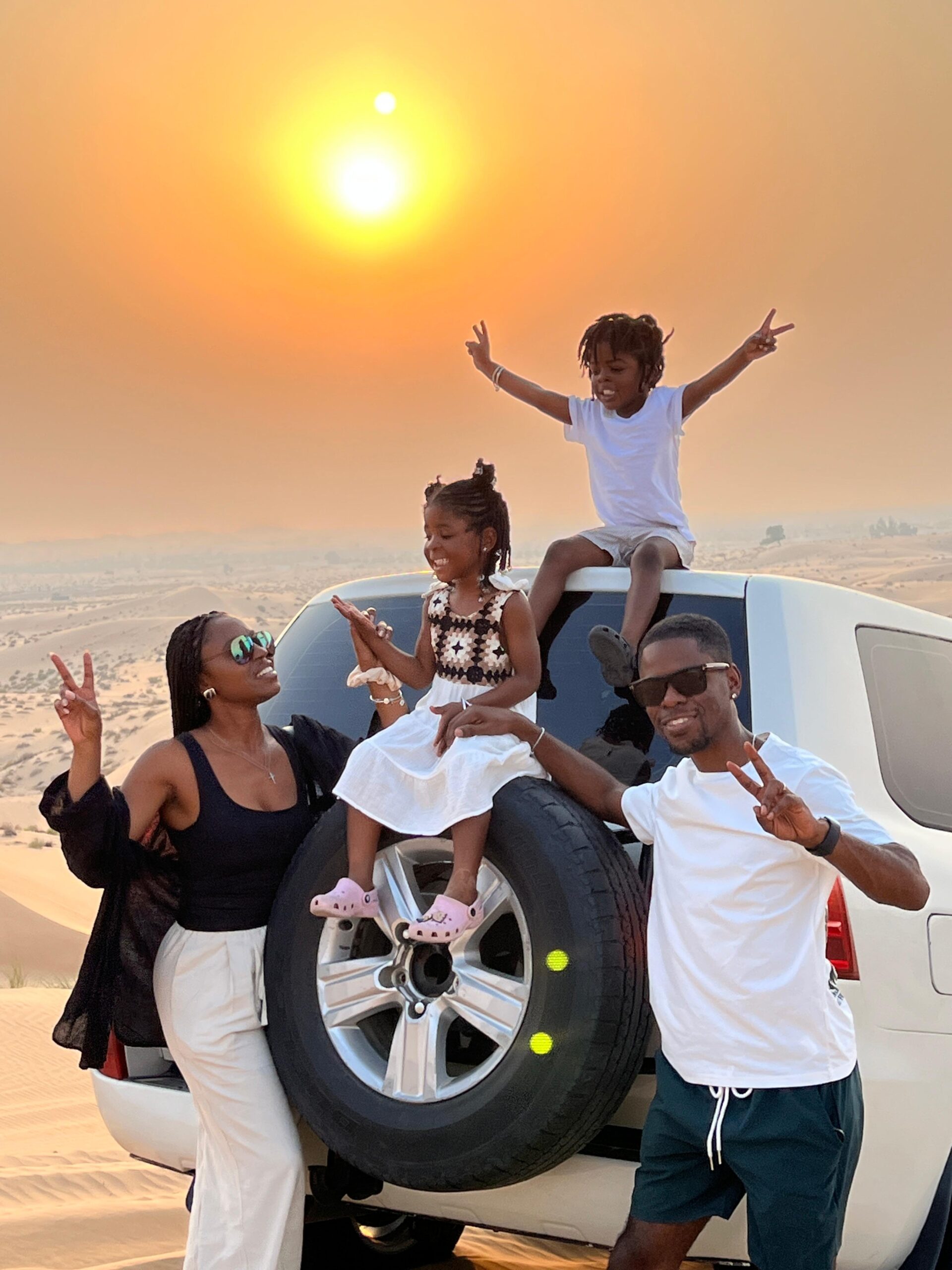 A powerful 4x4 vehicle mastering the art of desert driving across rolling sand dunes