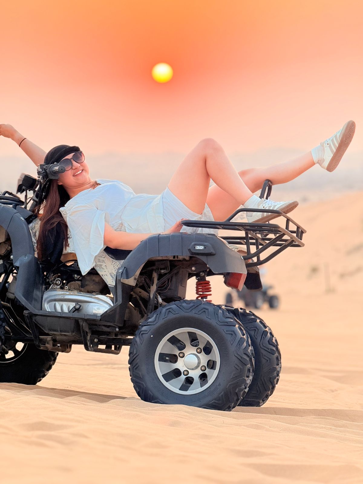 A captivating belly dance performance on the main stage during an Abu Dhabi desert safari evening
