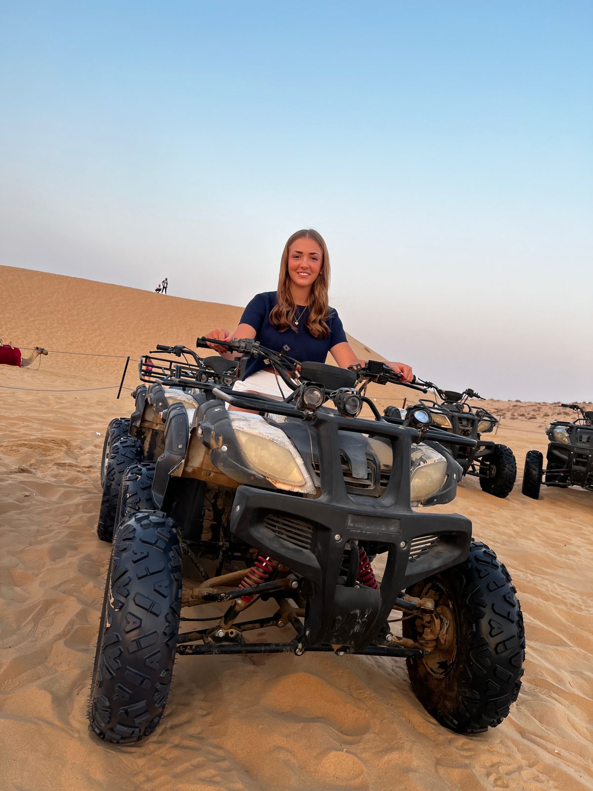 Infographic showing all activities, meals, and transfers included in our Abu Dhabi desert safari price