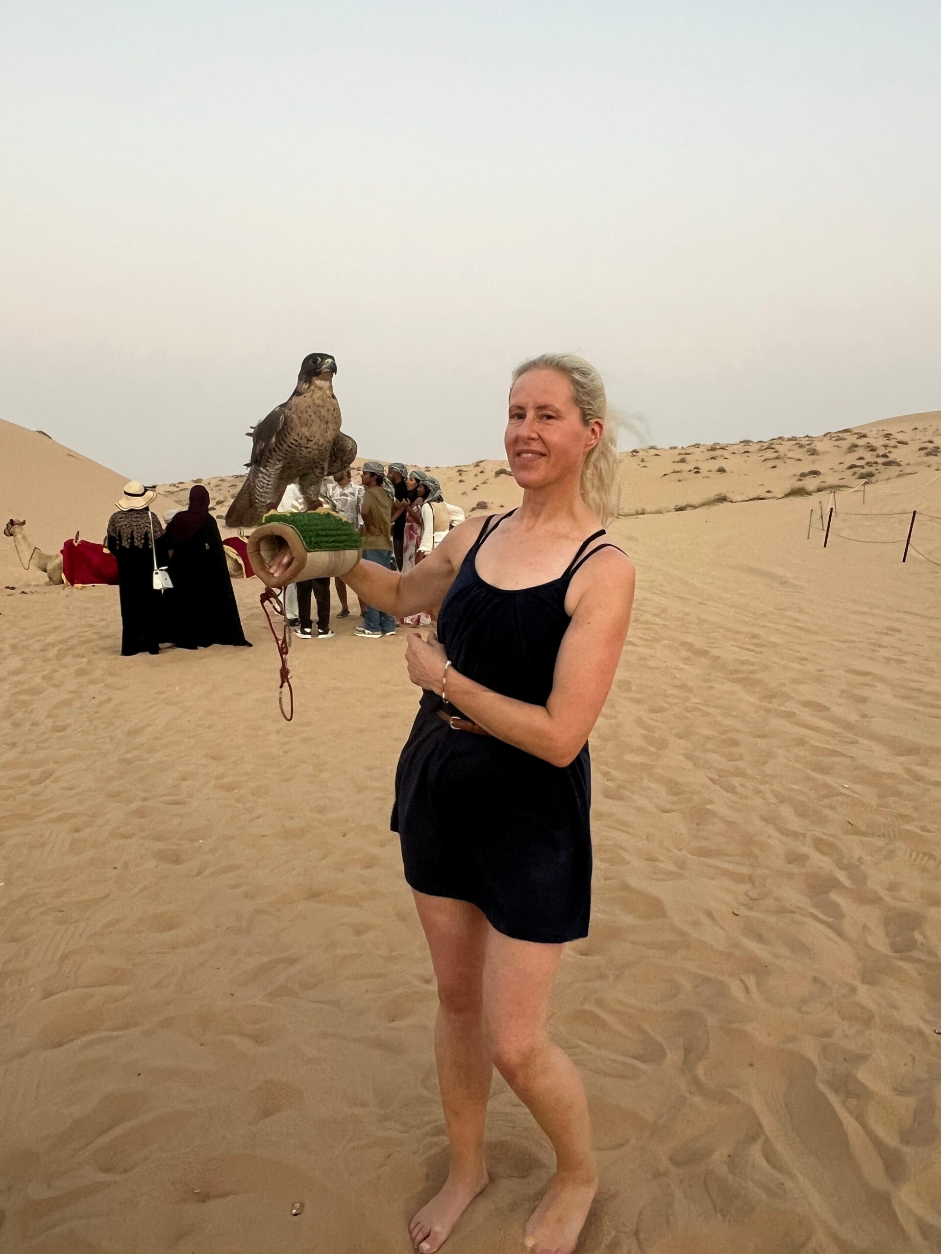 Beautiful traditional henna painting on hands with intricate Arabic patterns in Abu Dhabi